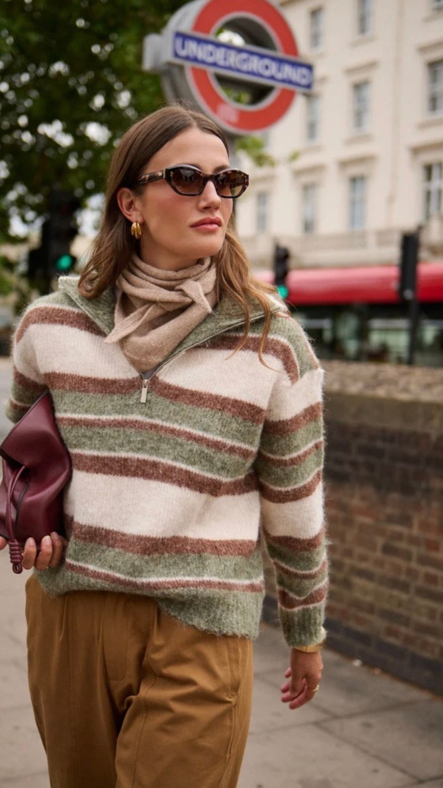 Striped sweater with zip collar